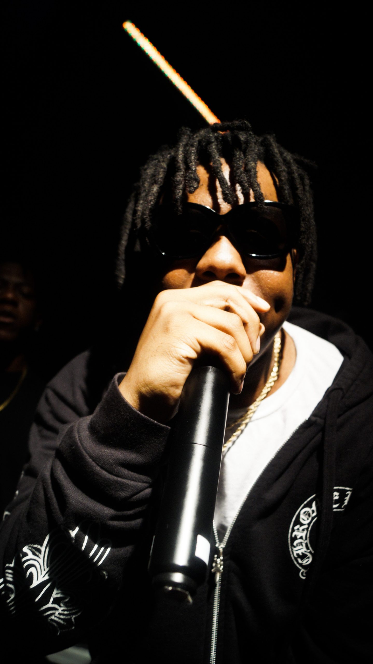 Artist Vonte* performing at a show.